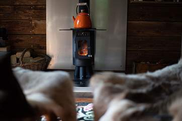 A delightful wood-burning stove keeps the cabin nice and toasty.