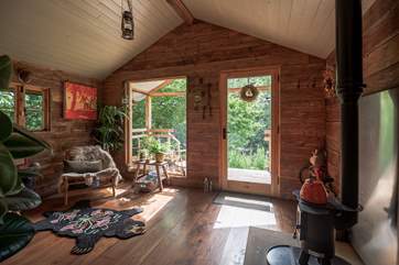 Plenty of natural light floods in through the large window and door.