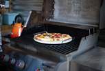 Enjoy freshly cooked pizzas from the barbecue grill.