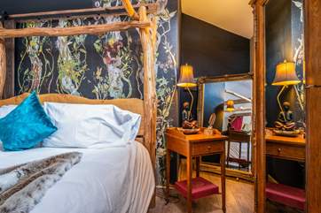 Warm woody tones mixed with the vibrant paint palette adds to the charming character of this cabin.