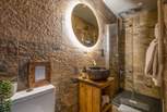 Freshen up in the stunning waterfall shower.