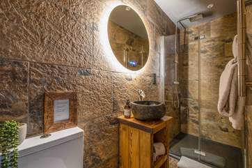 Freshen up in the stunning waterfall shower.