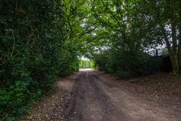 The lane approaching the double gates.