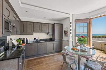 This stunning, contemporary ground floor apartment is beautifully furnished.