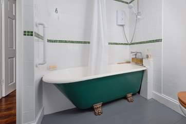 The family bathroom has a gorgeous clawfoot bath with shower over.
