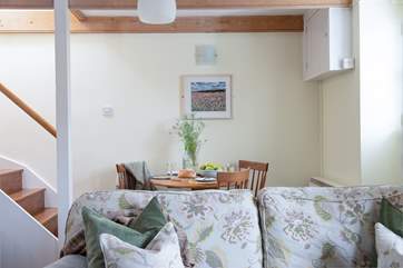 The staircase leads from the living area.