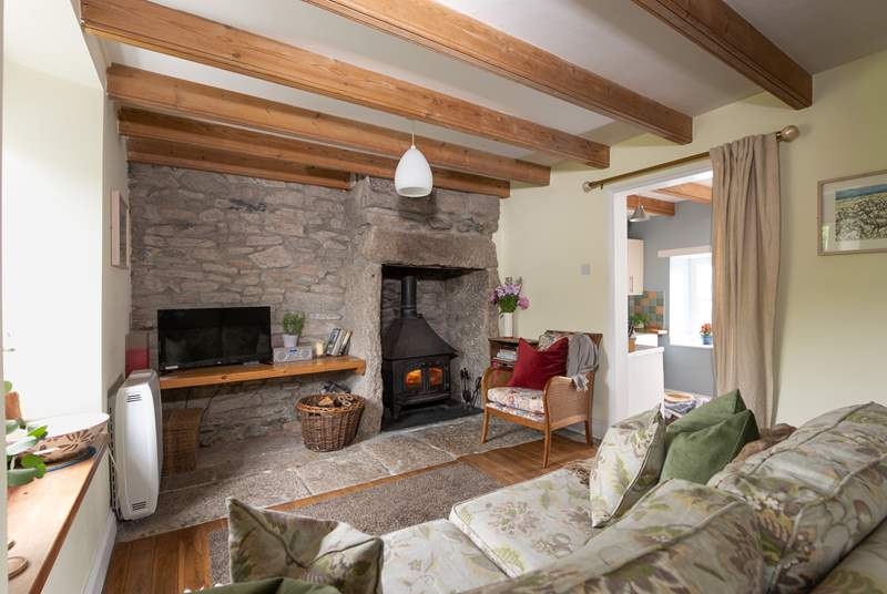 The cosy sitting/dining-room has a wood-burner to keep you warm throughout the seasons.
