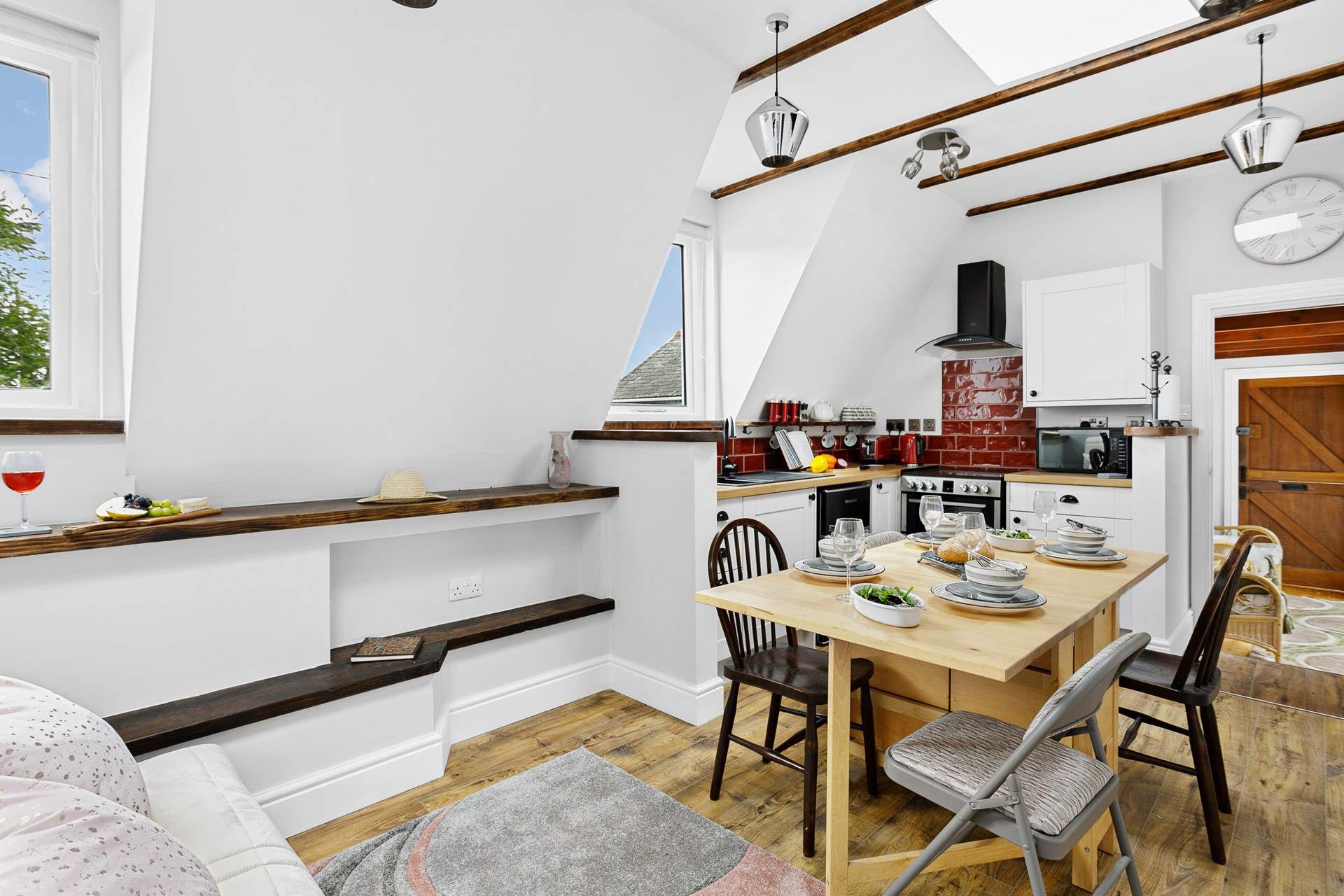 The bijou living space has oodles of character.