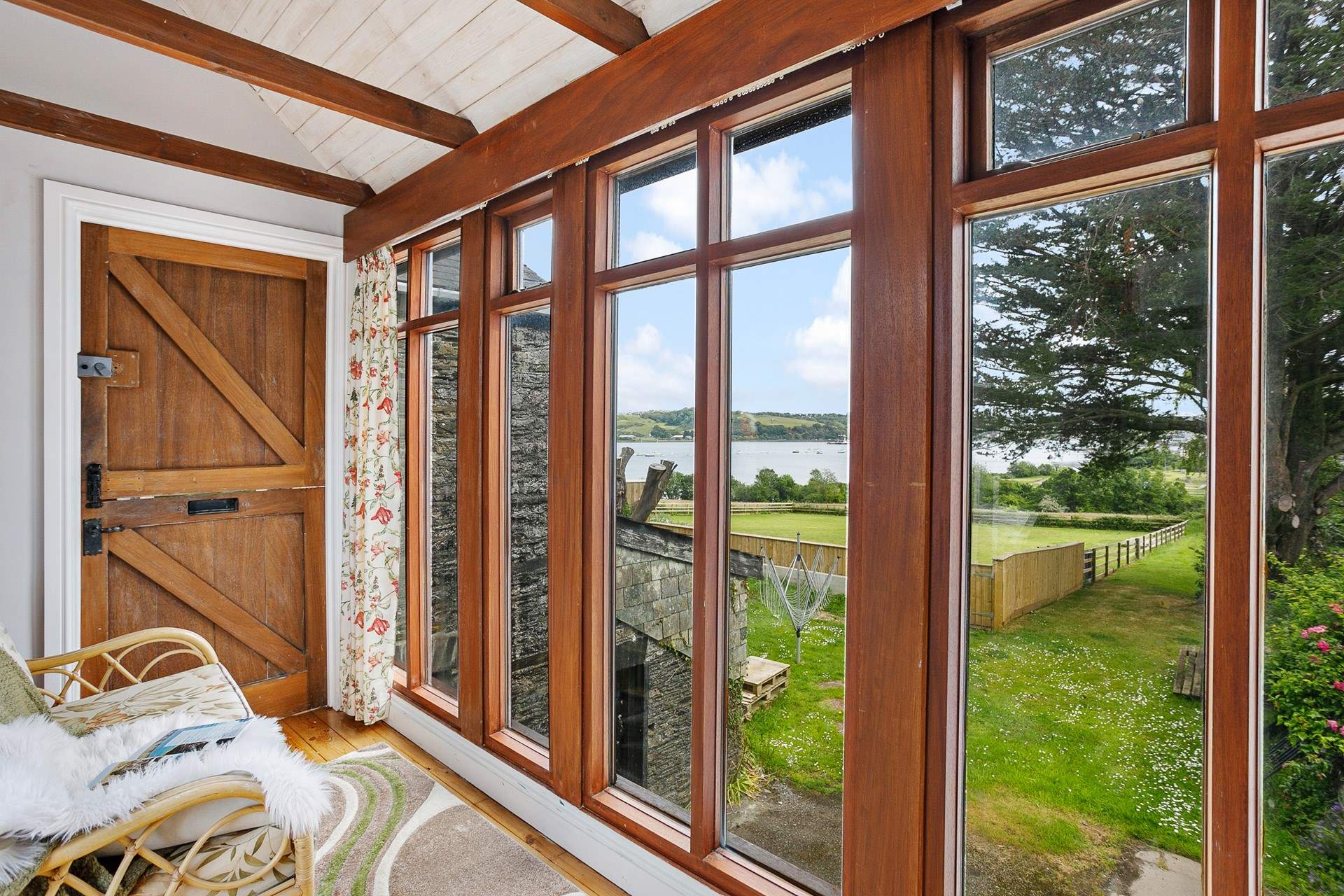The glass walkway gives a bird's eye view of the surrounding countryside and river - the perfect lookout room.