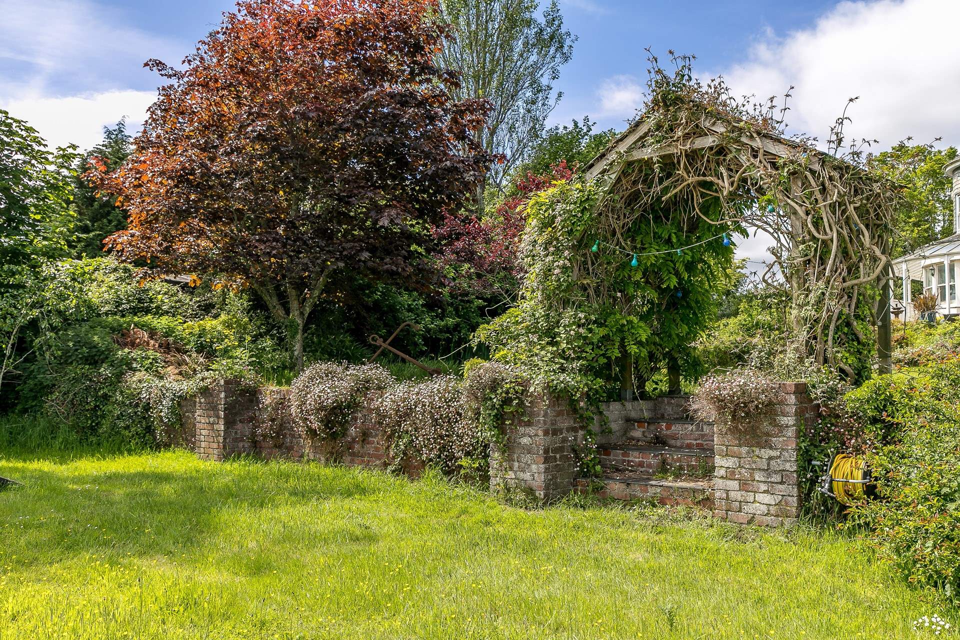 You are welcome to explore the owners' extensive gardens.