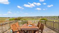 Enjoy a spot of al fresco dining on the delightful patio.