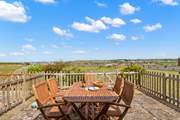 Enjoy a spot of al fresco dining on the delightful patio.