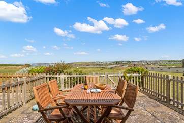 Enjoy a spot of al fresco dining on the delightful patio.