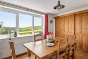 Enjoy delicious meals at the homely dinner table.