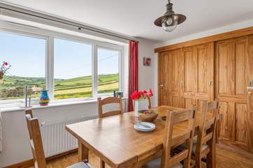 Enjoy delicious meals at the homely dinner table.