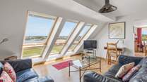 The excellent windows allow plenty of gorgeous sun into the property.