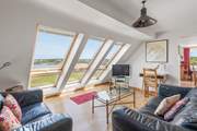 The excellent windows allow plenty of gorgeous sun into the property.