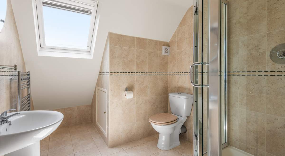 Bedroom two comes complete with a beautifully finished en suite shower-room.