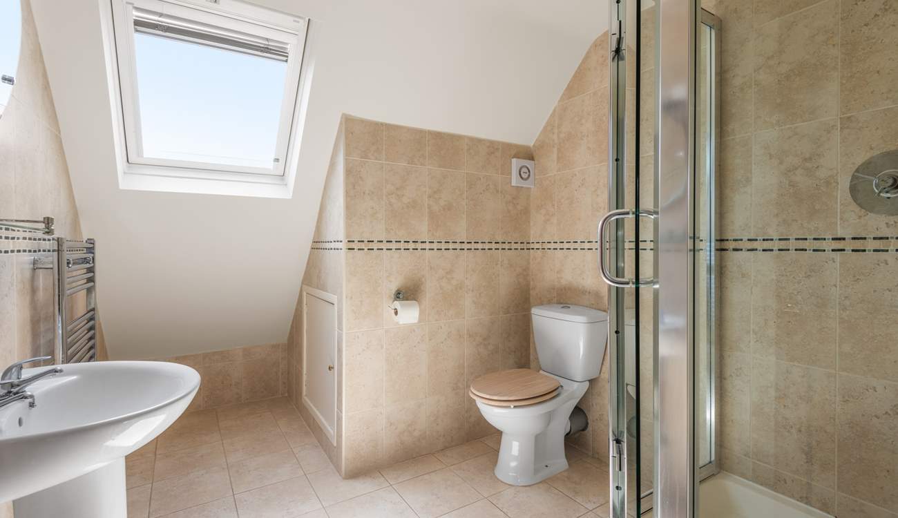 Bedroom two comes complete with a beautifully finished en suite shower-room.