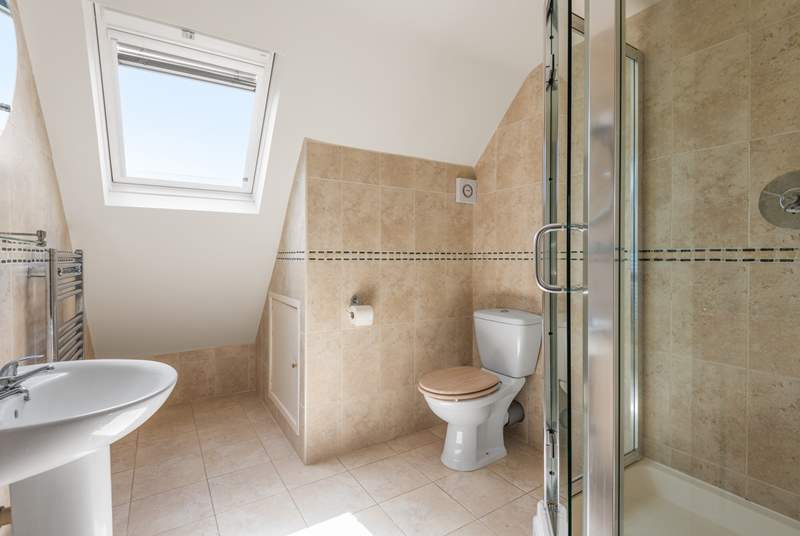 Bedroom two comes complete with a beautifully finished en suite shower-room.