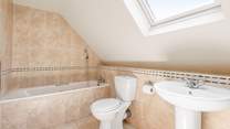 Relax in the gorgeous family bathroom.
