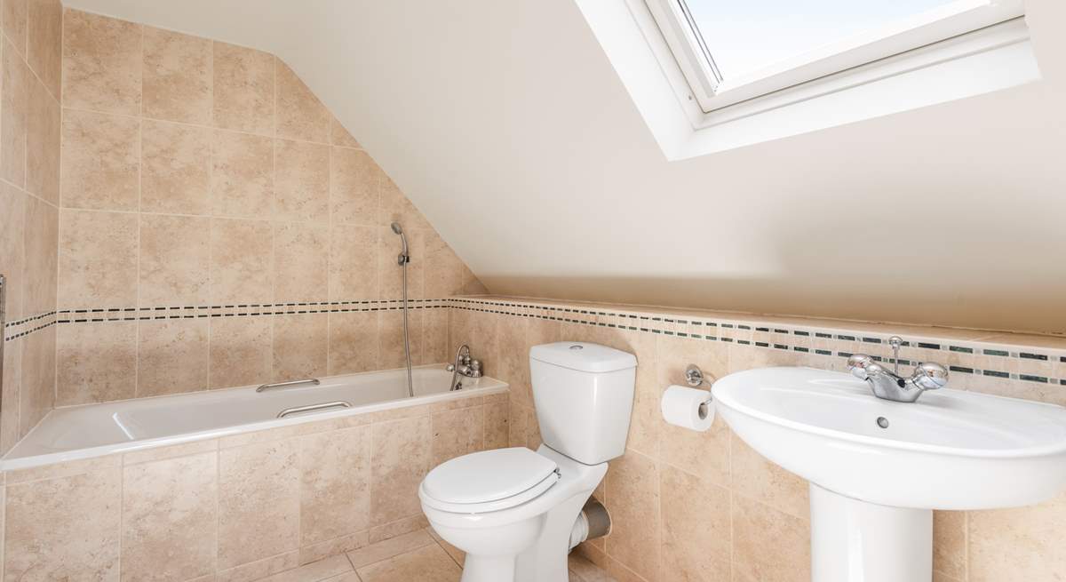 Relax in the gorgeous family bathroom.