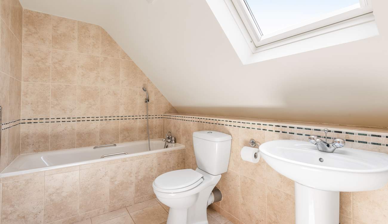 Relax in the gorgeous family bathroom.