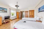 This spacious room comes equipped with a brilliant Smart TV.