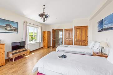 This spacious room comes equipped with a brilliant Smart TV.