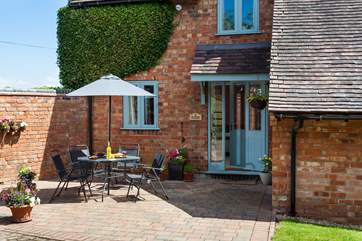 Cute entrance with sunny courtyard to enjoy breakfast.