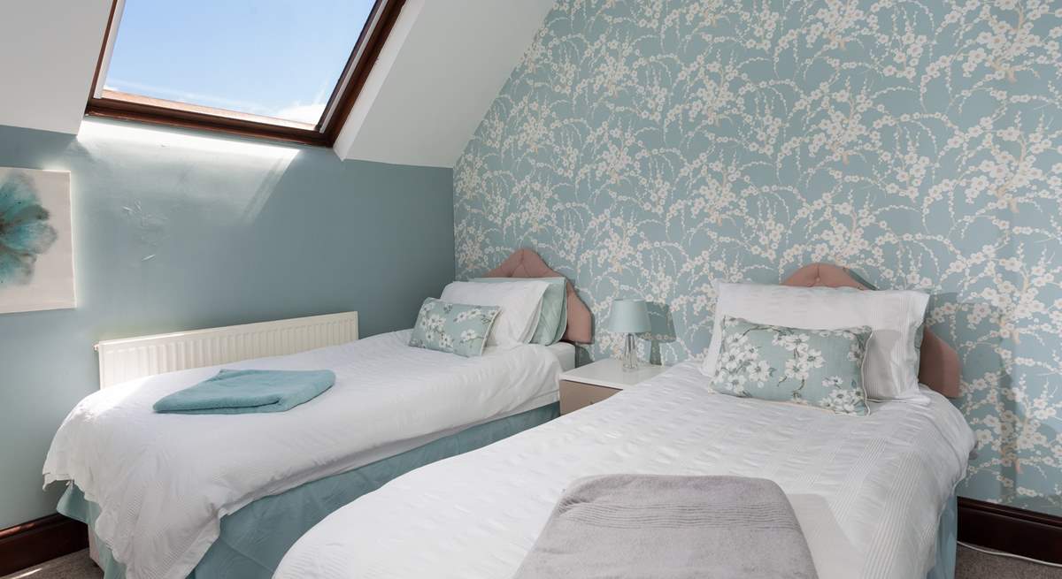 The delightful twin room is perfect for a good night's sleep.