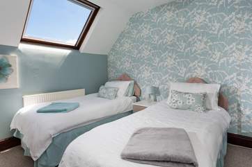 The delightful twin room is perfect for a good night's sleep.