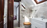 There is a Jack and Jill bathroom, shared by both bedrooms. - Thumbnail Image