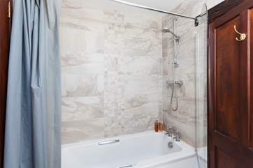 Unwind in the fabulous bath after a long day.
