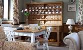 The charming dining-table is great for cosy suppers. - Thumbnail Image