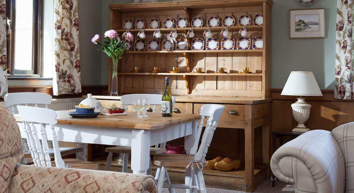 The charming dining-table is great for cosy suppers.