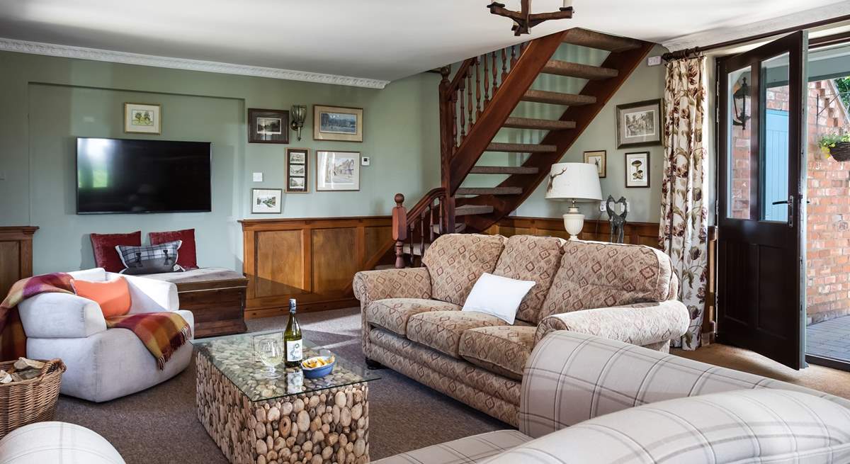 The inviting sitting-room welcomes you as you enter.