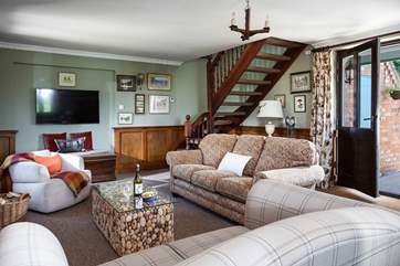 The inviting sitting-room welcomes you as you enter.