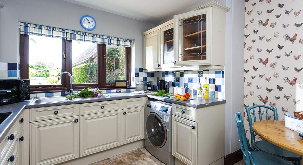 The homely kitchen area has everything you'll need.