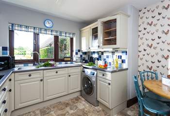The homely kitchen area has everything you'll need.