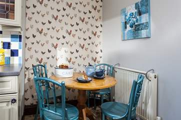 Enjoy a warming coffee in the morning on this delightful table.