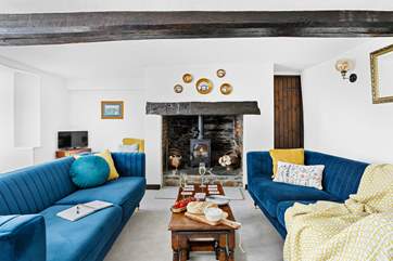 A stunning period fireplace sits in the centre of the main sitting-room. You will find bedroom three and four leading off of this room.