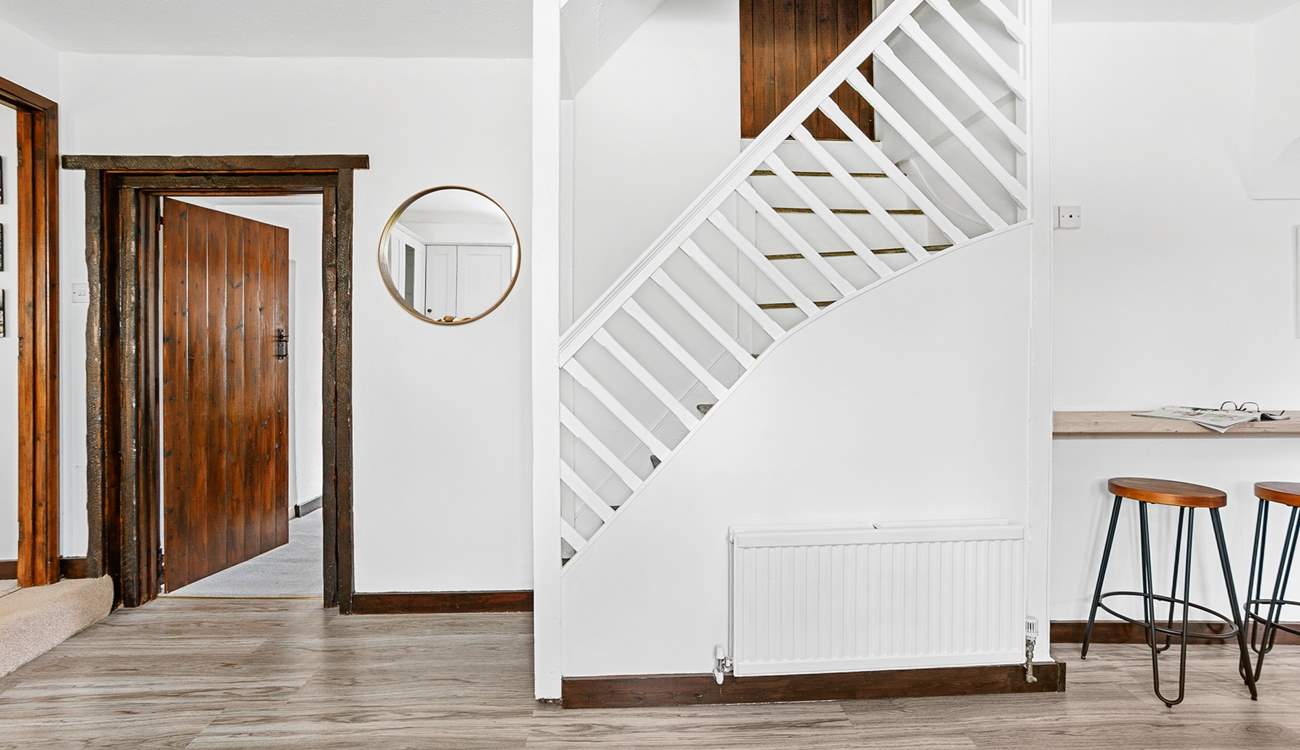 Stairs from the kitchen leading up to bedroom 5.