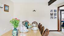 Gather around the fabulous dining-table and enjoy delicious meals together.