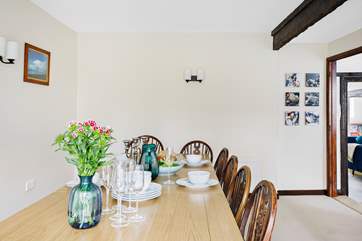 Gather around the fabulous dining-table and enjoy delicious meals together.