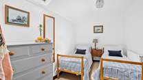 Bedroom 3 is only for little ones, with two charming two-foot six-inch single beds.