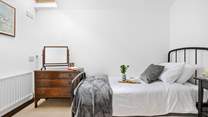 Bedroom 4 also has a single bed with a trundle bed underneath it.