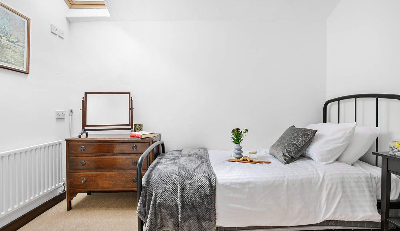 Bedroom 4 also has a single bed with a trundle bed underneath it.