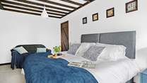 Bedroom 5 houses another 'zip and link' super-king with a chic en suite.