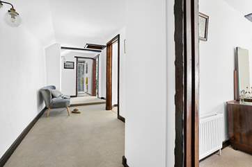 The landing links all the bedrooms together, however it's so large the children of the family will love sitting together and nattering in the morning.